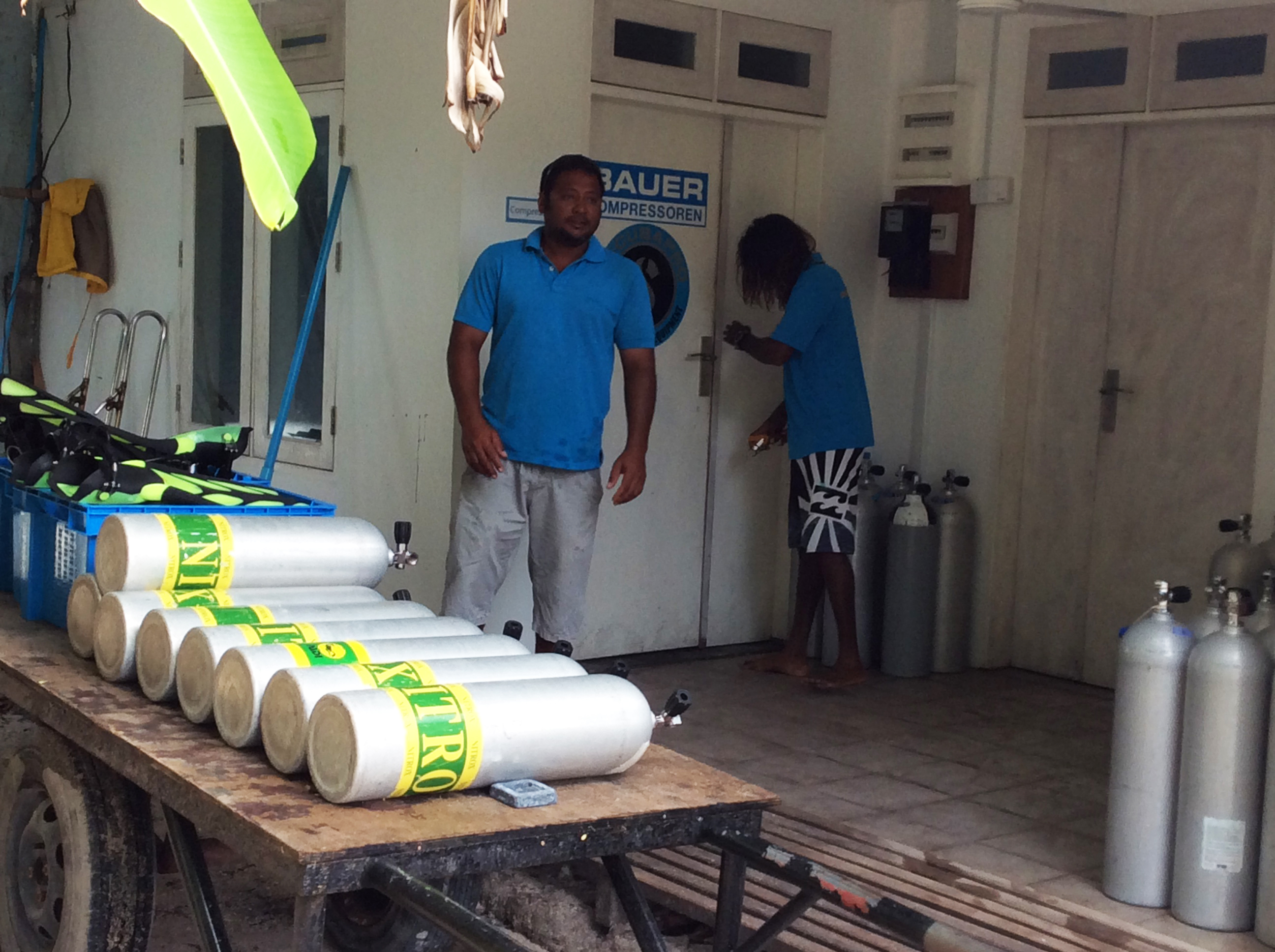 Boutique Beach Maldives Dive Team preparing Diving Equipment and Nitrox Tanks