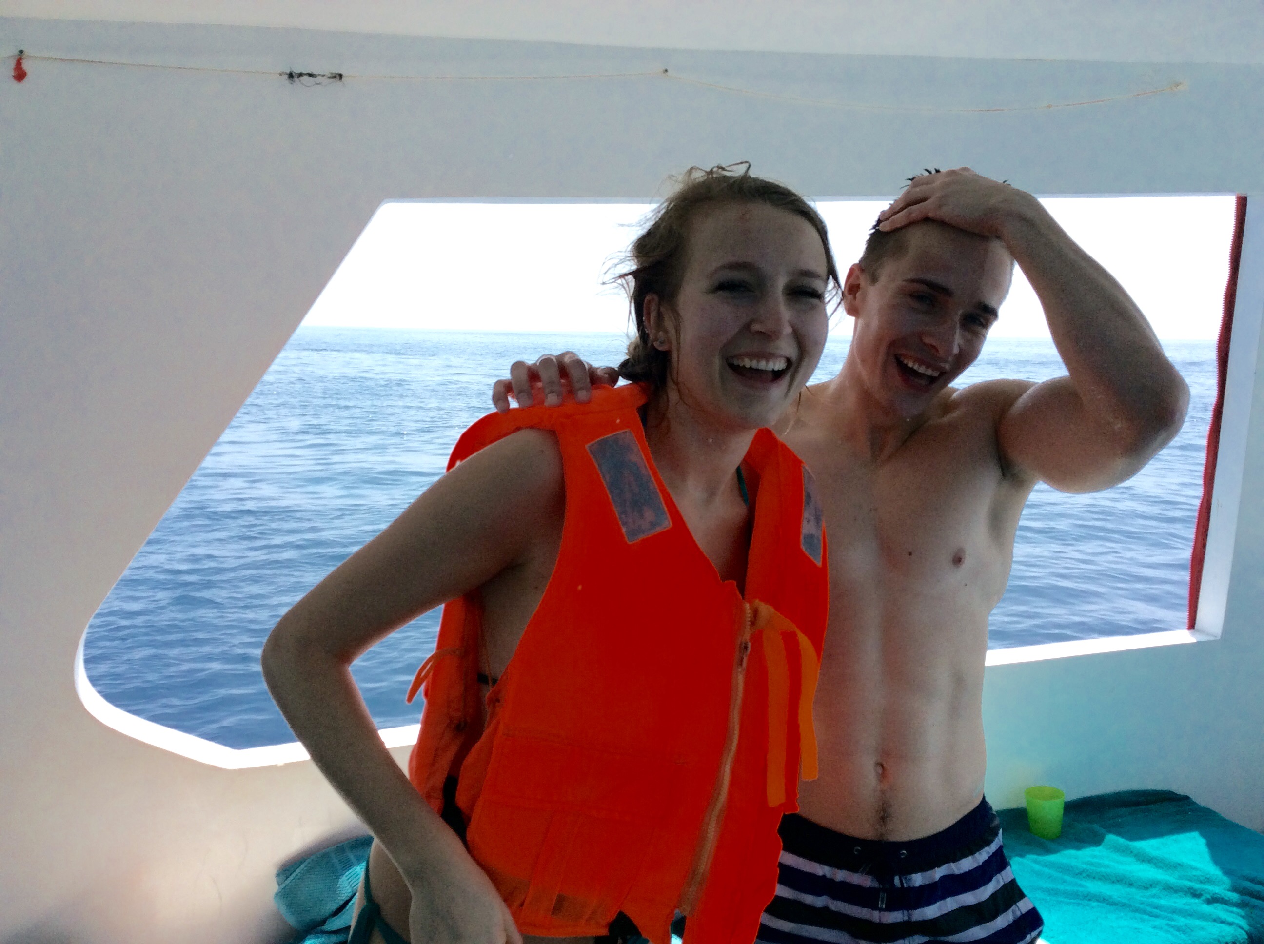 Boutique Beach Hotel Guests Smiling on Board the Dive Boat